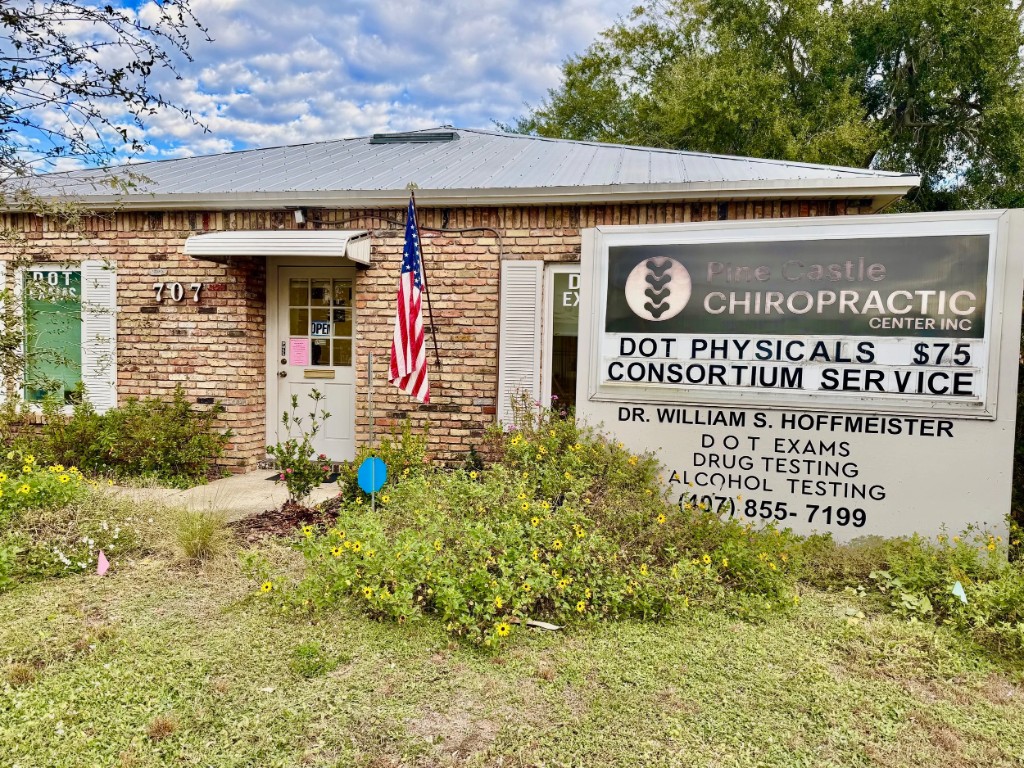 Pine Castle Chiropractic Center building and sign at 707 E Oak Ridge Rd